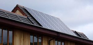 Fig. 2 - Bolt-on PV enables standard modules to be used with a normal concrete roof tile construction.