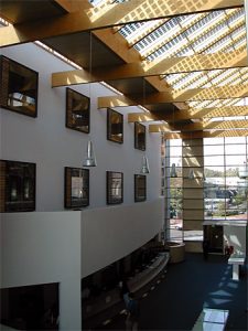 Fig. 1 - Building integrated photovoltaics in commercial buildings offers the potential for significant offsetting of cost through avoided use of materials. In this particular case a bespoke solar shading solution was avoided.