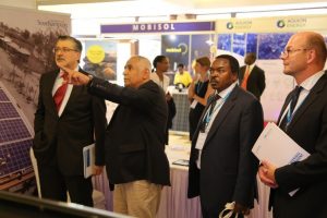 Prof Bahaj explaining the 6 rural electrification project to IRENA Director General Adnan Amin, Ministry of Energy Renewables Director Eng. Isaac Kiva and ARE's Marcus Wiemann.